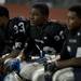 Lincoln senior wide receiver Tyree Waller (left) and teammates in the remaining minutes of the game against Chelsea High School on Friday. Lincoln lost 41-20. Daniel Brenner I AnnArbor.com